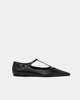 side view of black flats with t strap in leather