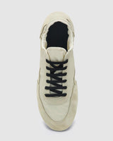 top view of suede sneakers in creamy white leather