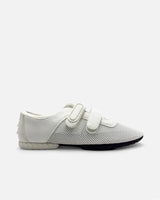Side view of white sneaker with double straps