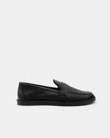 Side view of black penny loafers in leather