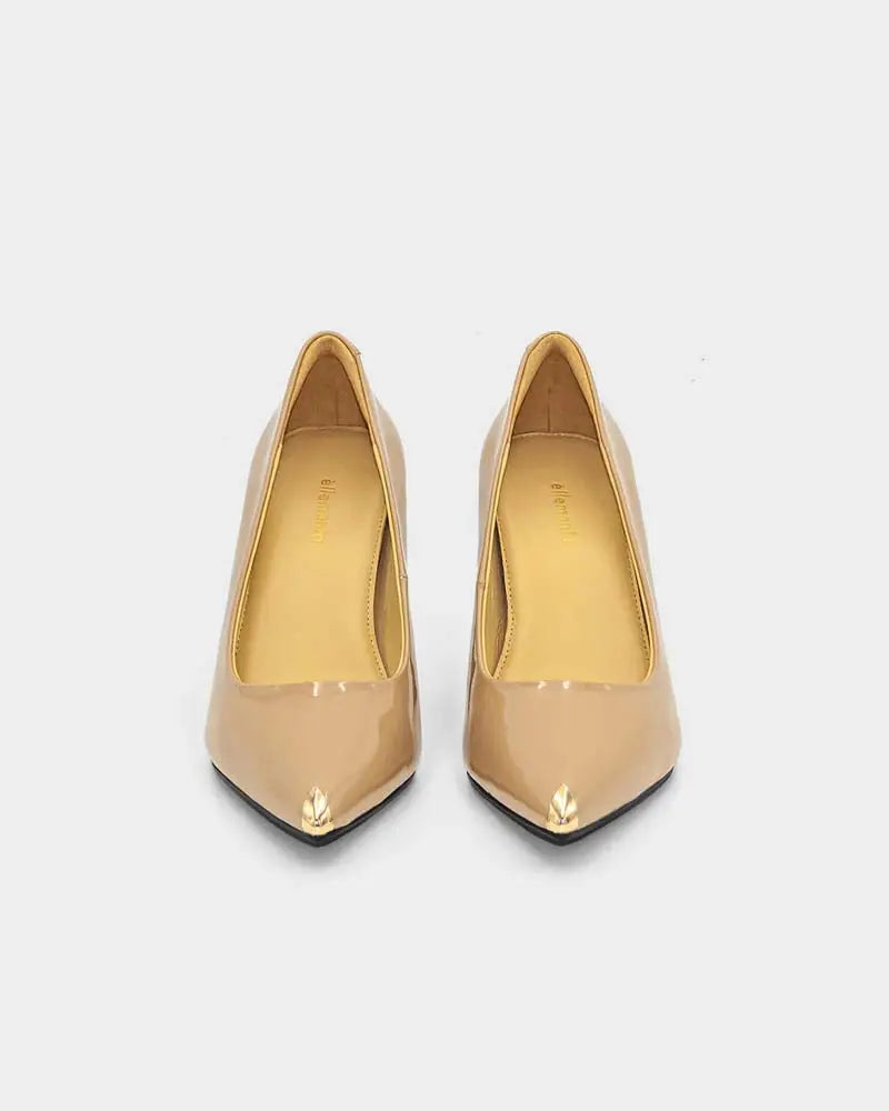 Pair of nude leather high heel pumps