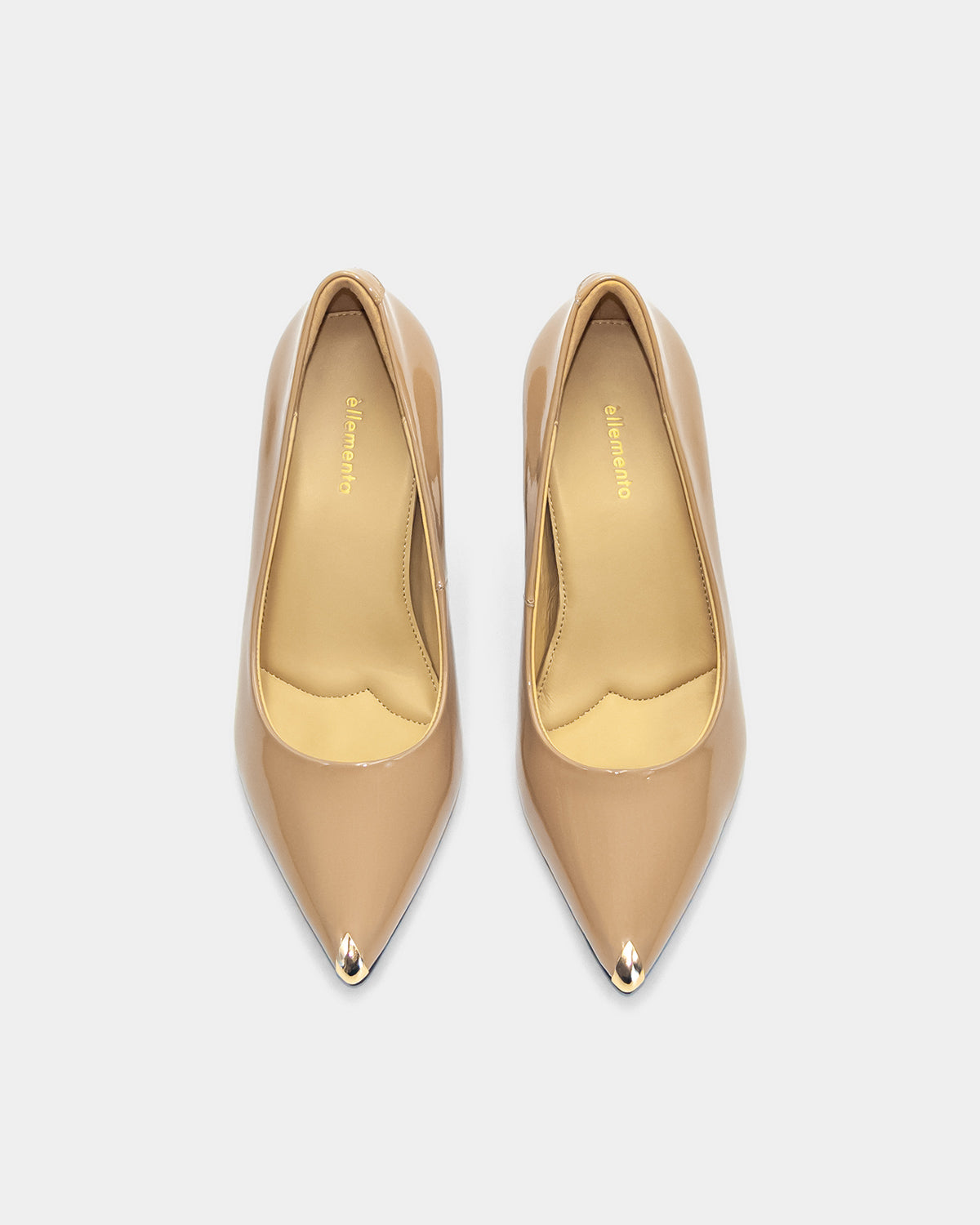 Pair of nude high heel pumps with cushioned insole