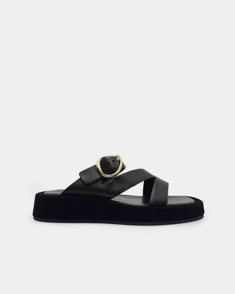Black platform sandal with a gold buckle