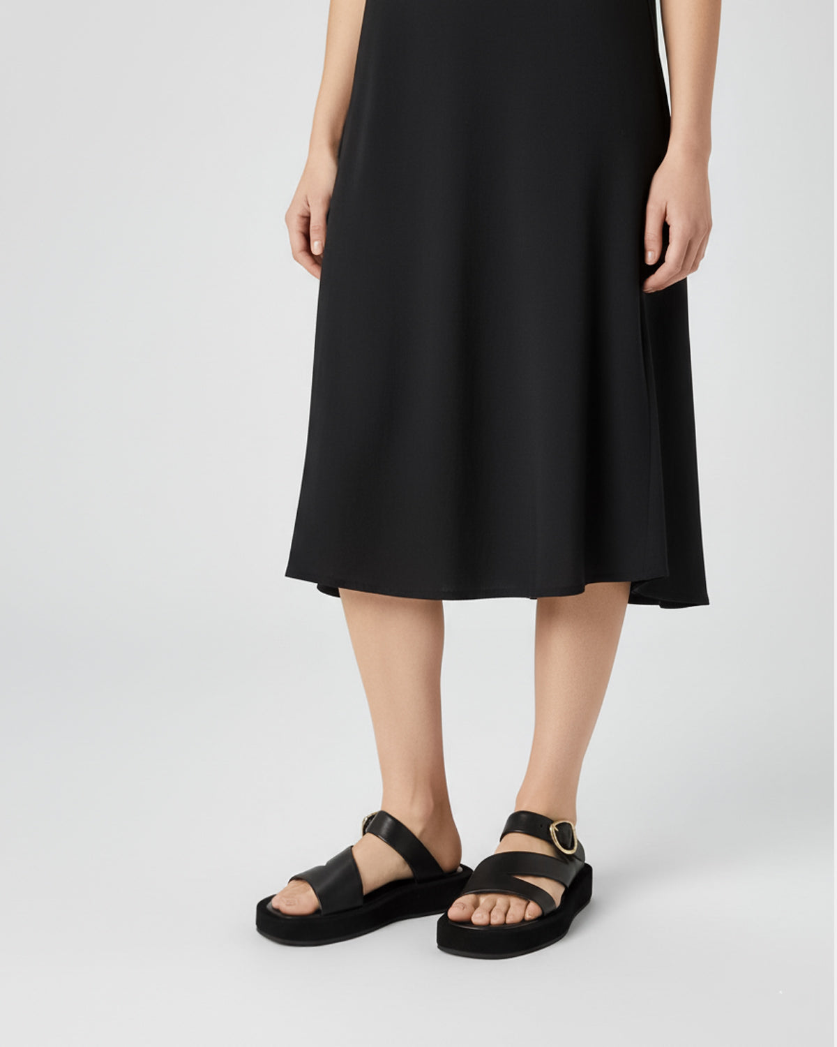 Women's black platform sandals in suede leather with gold buckle