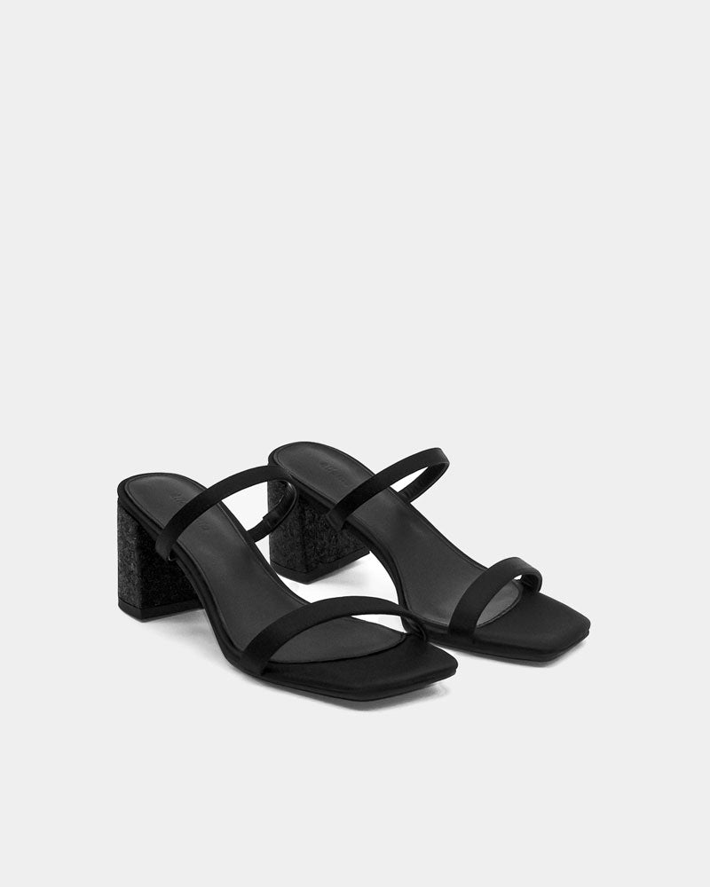 Pair of black slide sandals with comfort block heels and straps