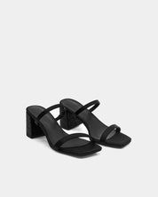 Pair of black slide sandals with comfort block heels and straps