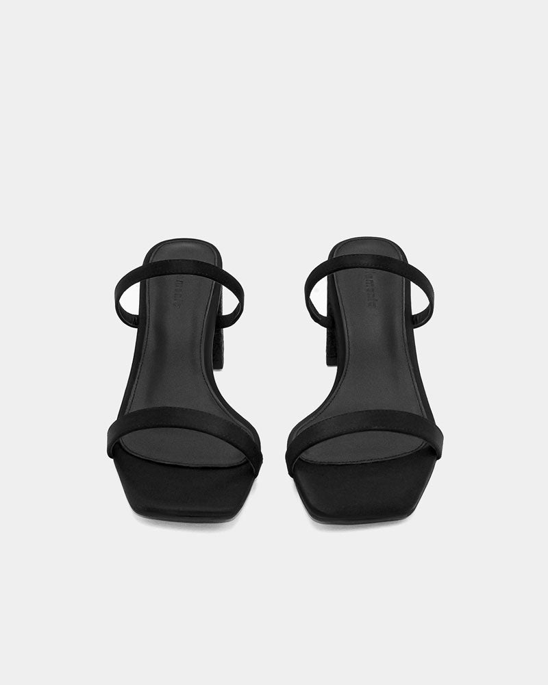 Black heeled slide sandals with padded leather footbed 