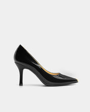 Side view of heeled pumps in patent leather