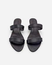 Top view of black strappy sandals 