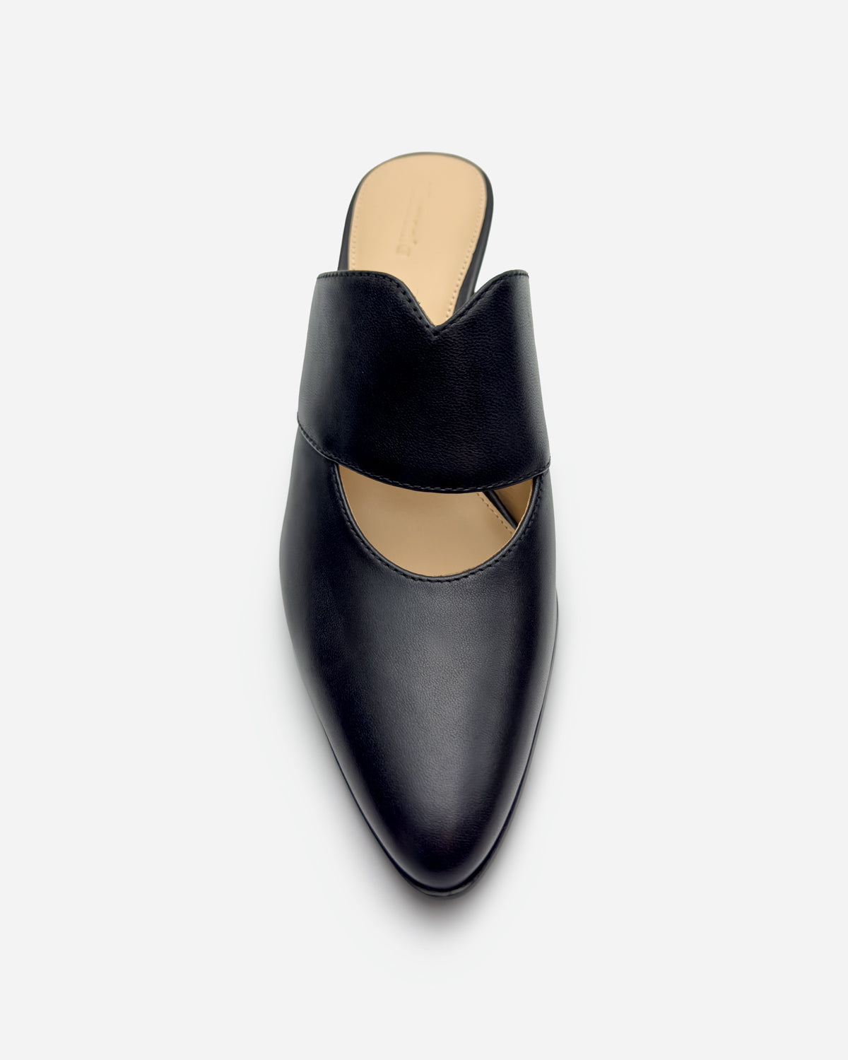 Top view of a black mule shoe in leather