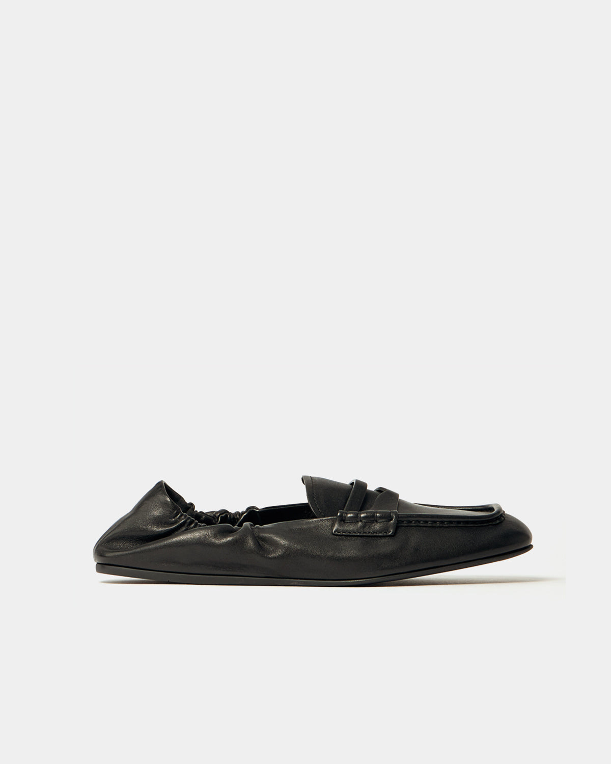 Black loafer shoe on a white background