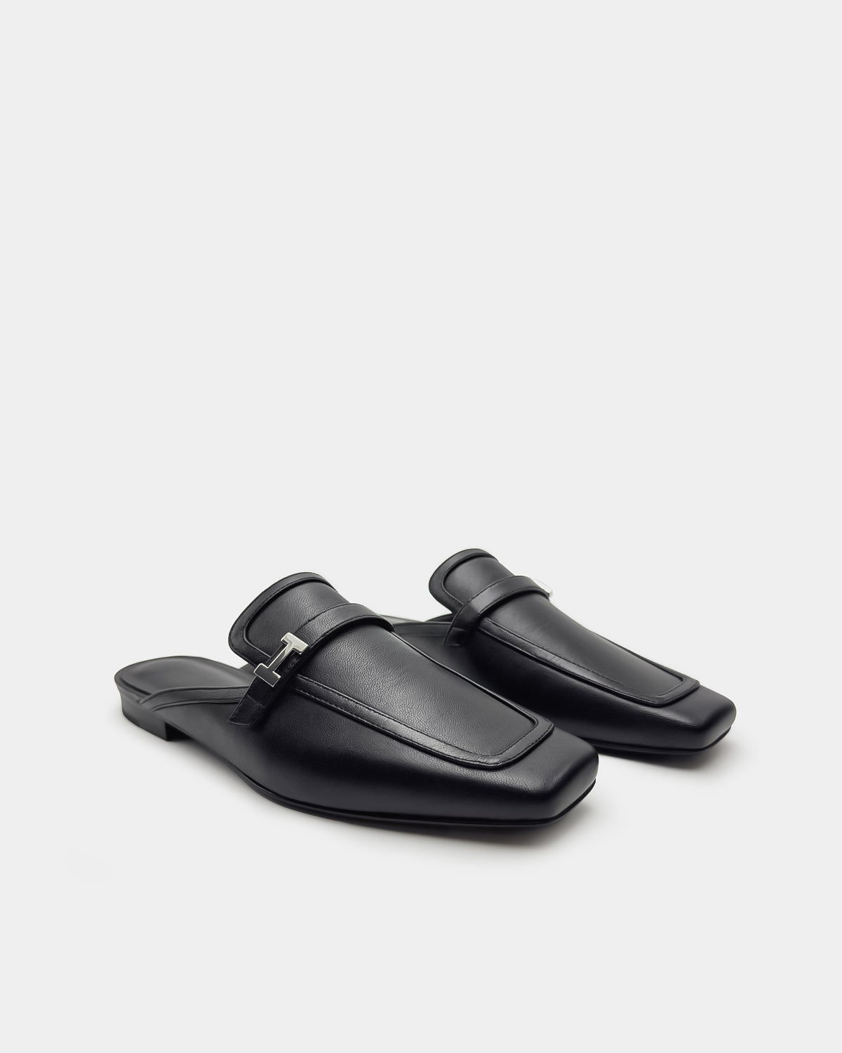 Women's black leather mules flat slip on comfort for work and everyday 