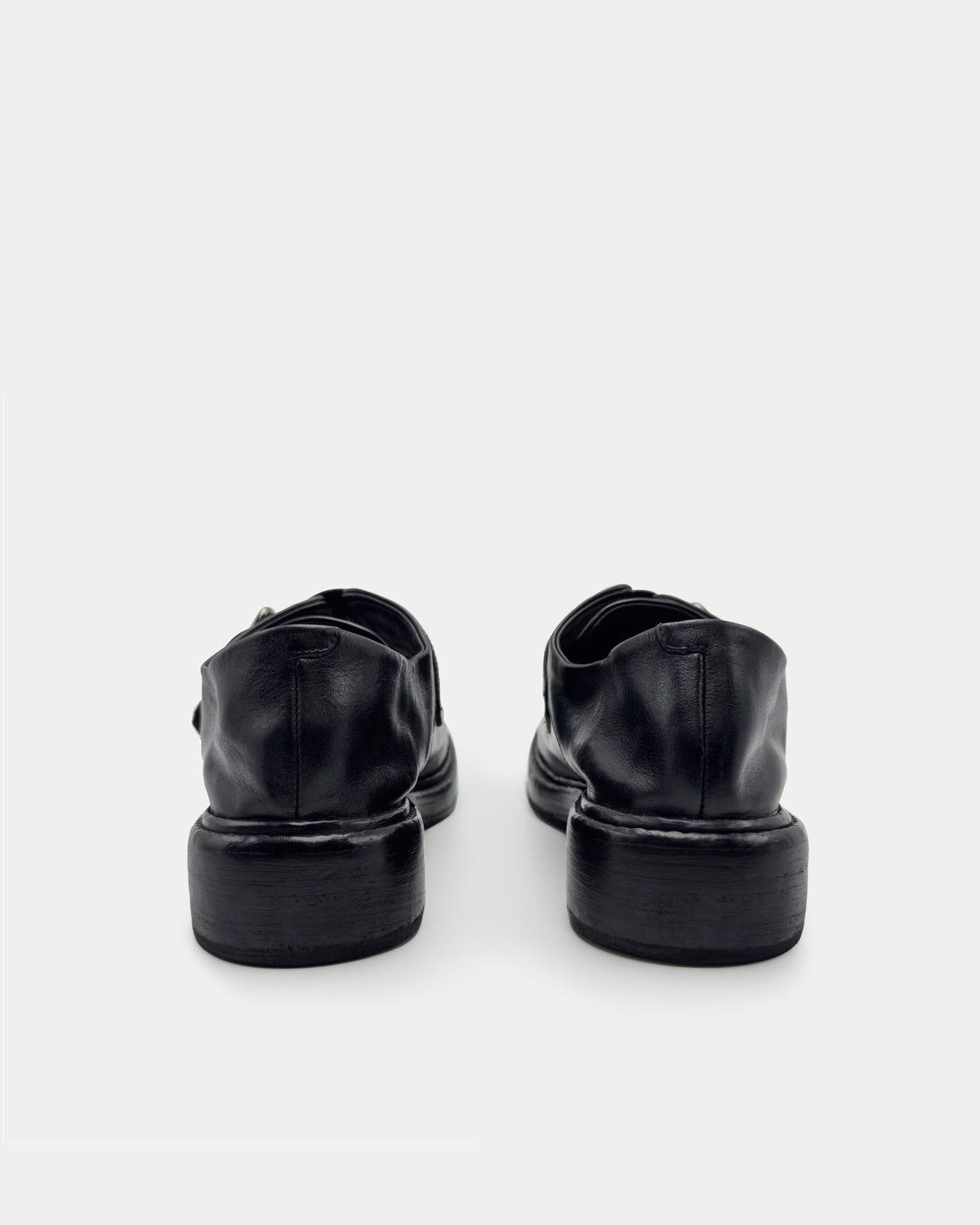 Women's black monk loafers in soft leather that are comfortable for walking
