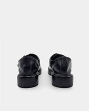 Soft leather back heel of women's black loafers