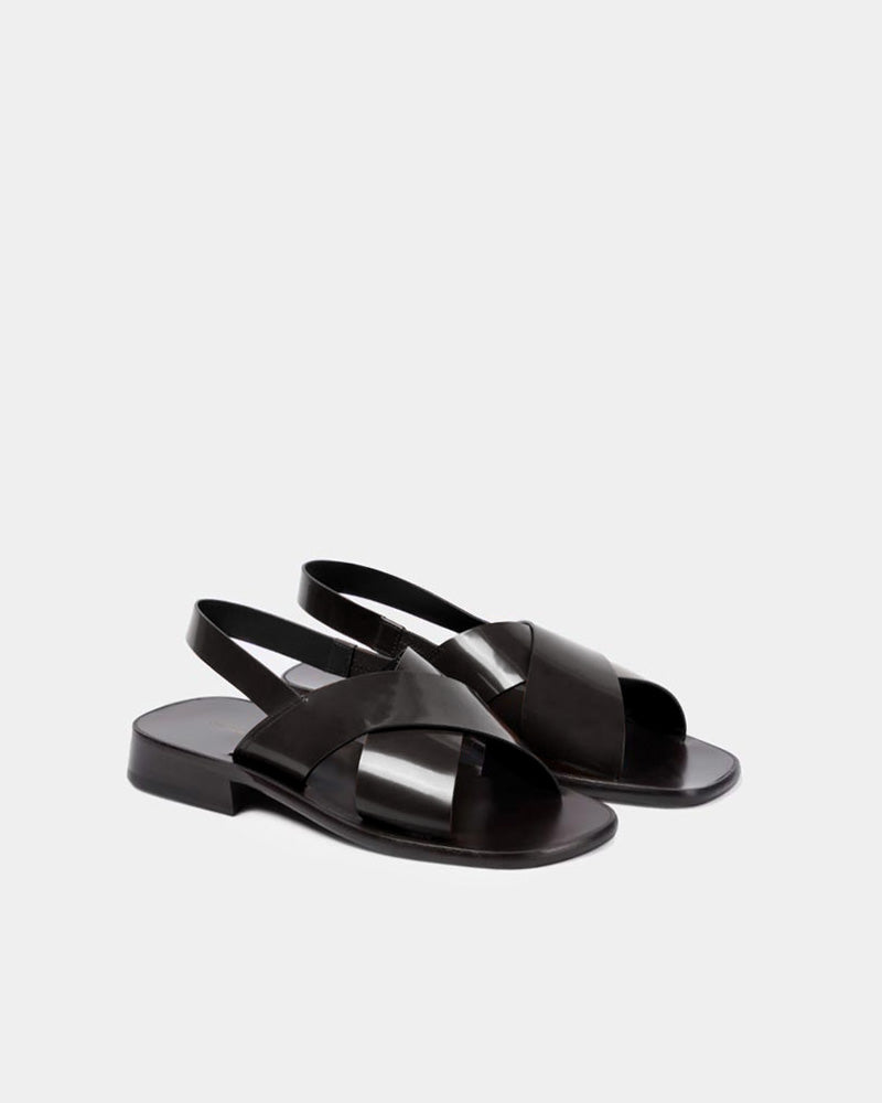 Pair of black leather slingback sandals