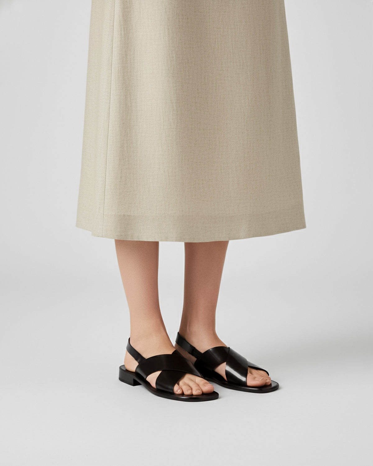 Women's black leather sandals with flat slingback style Australia