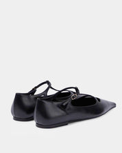 Pair of black t-strap flats in leather adjustable fit