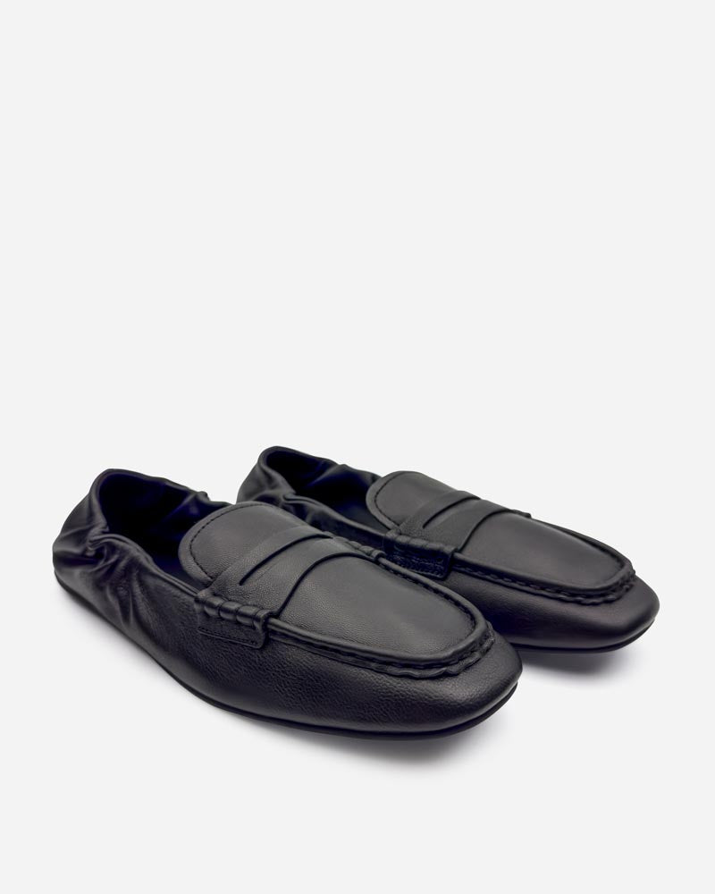 Pair of black loafers for women in soft leather