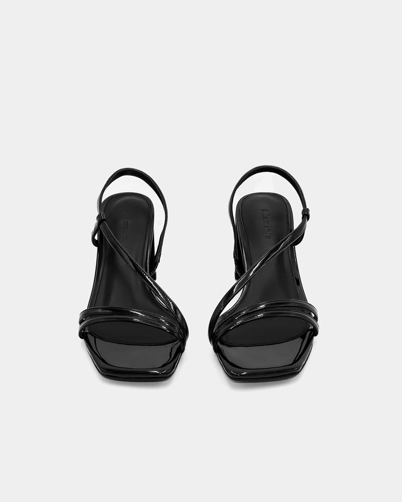 Patent black strappy sandals with cushioned leather footbed for all-day comfort