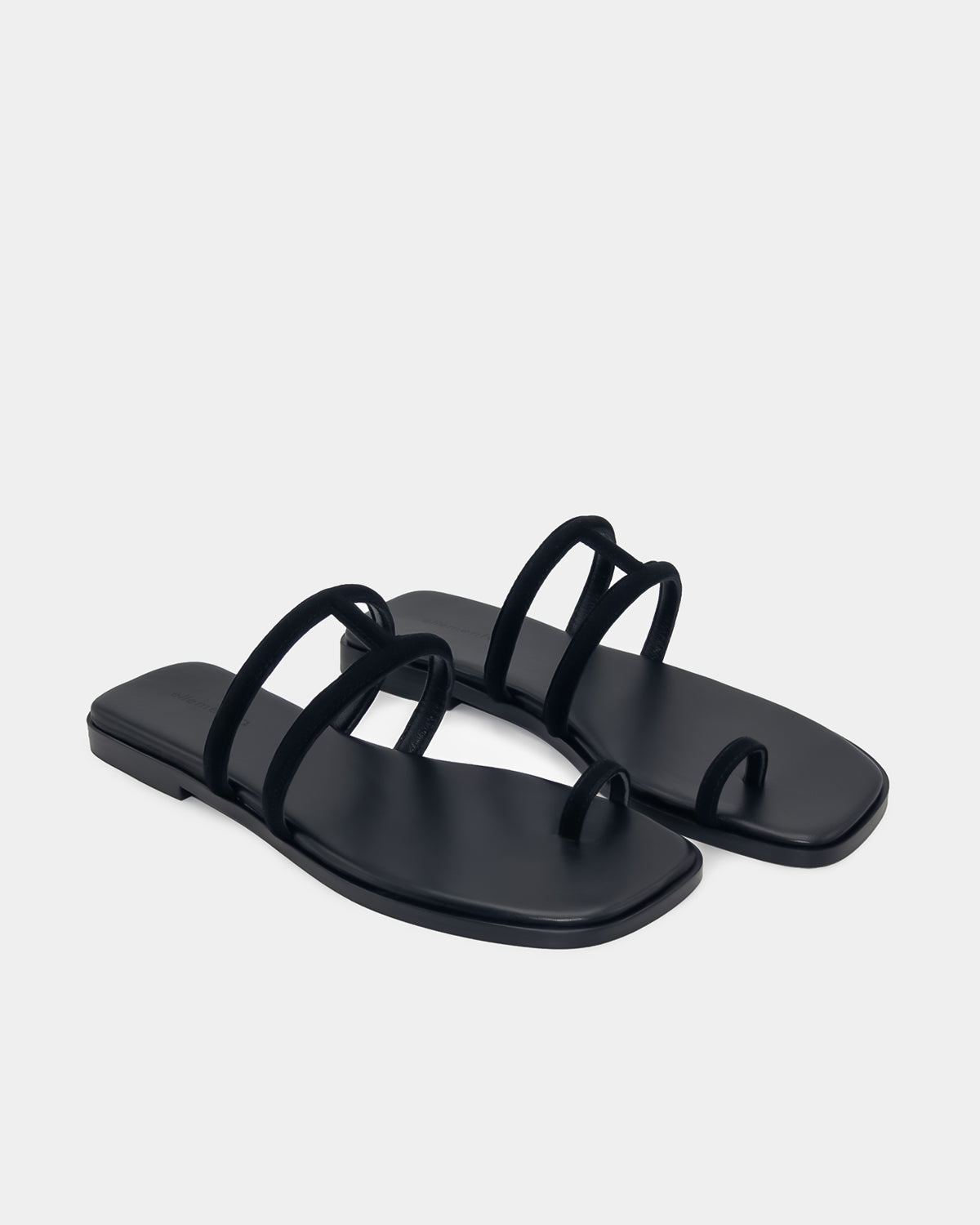 Black slide sandals with leather cushioned footbed for women