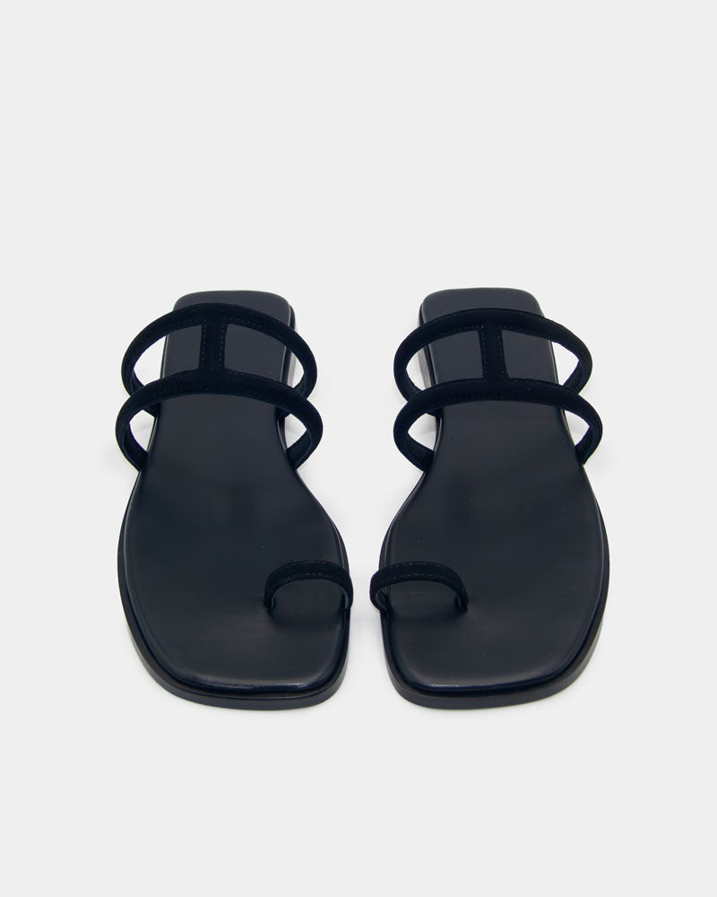 Pair of black slide sandals with cushioned leather footbed
