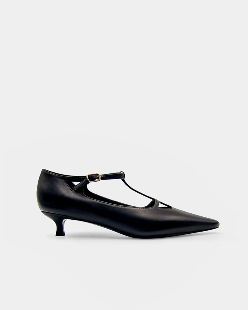 Side view of black t-strap kitten heels