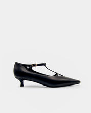 Side view of black t-strap kitten heels