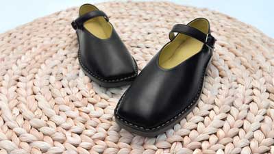 Handcrafted black leather ballet flats that are comfortable leather shoes or work and play