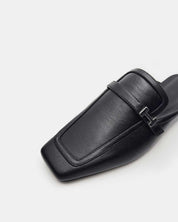 Modern lack leather loafer mules with square toe and silver buckle