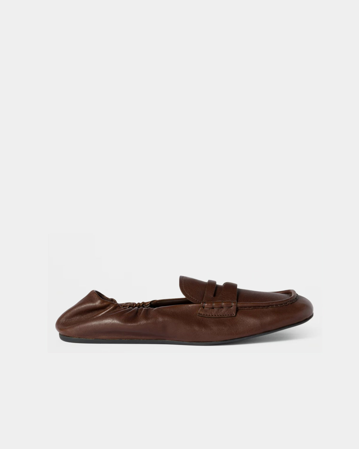 Brown loafer shoe on a white background