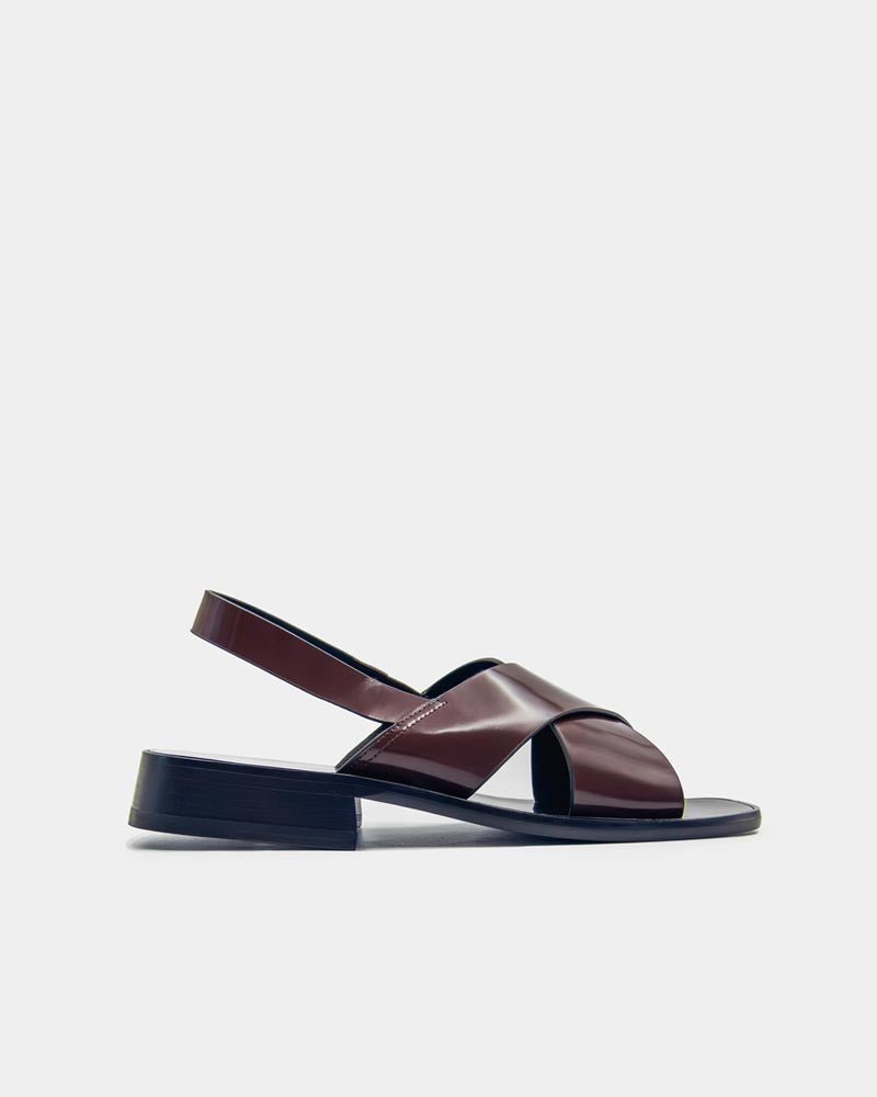 Side view of brown leather sandals for women  