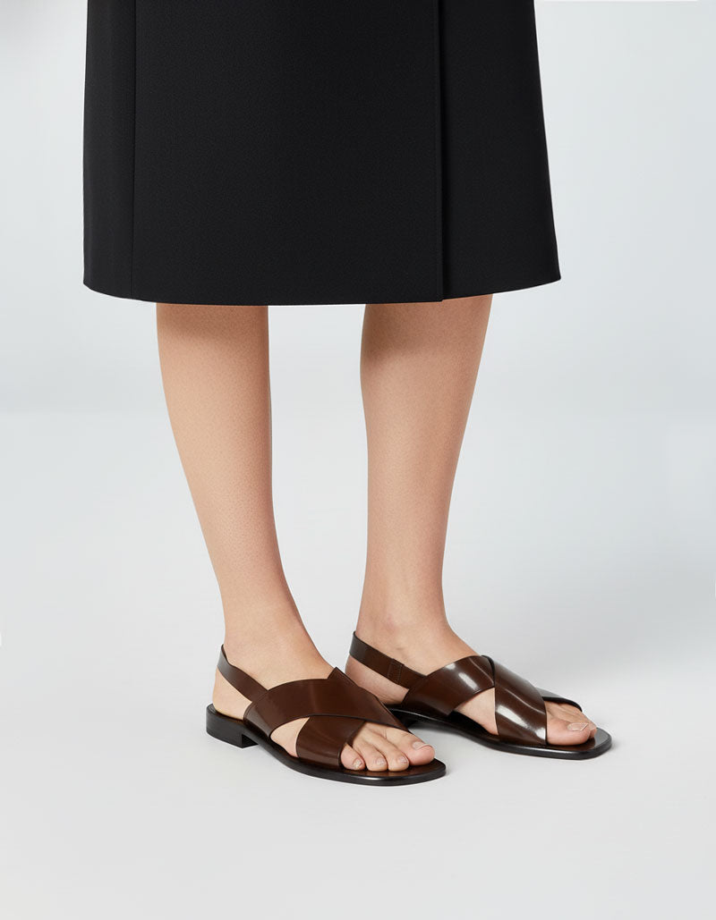 woman wearing dark brown leather slingback sandals 