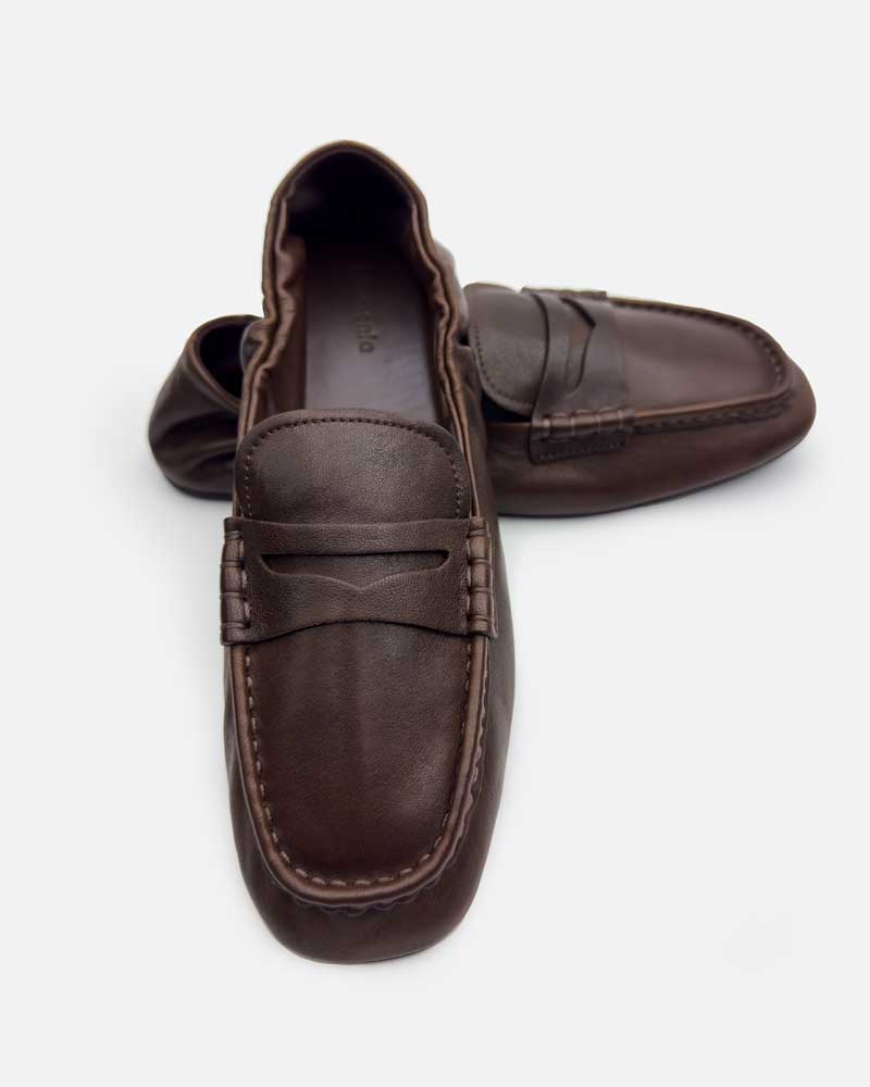 Top view of square-toe ladies leather loafers in brown