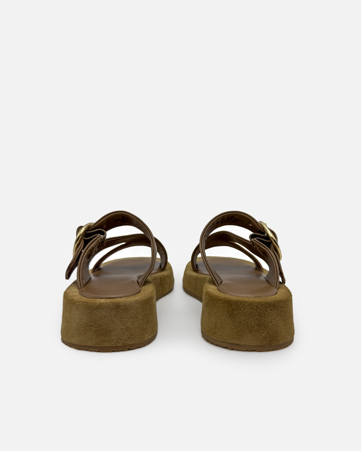 Pair of brown platform sandals in suede leather and straps