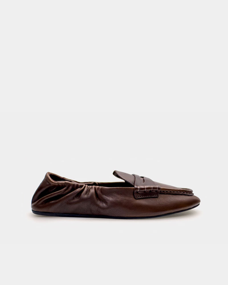 side view of women's brown loafer in soft leather