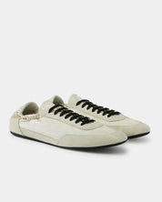 creamy white suede sneakers with black lace