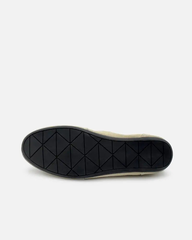 flexible rubber sole of suede sneakers 