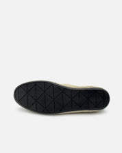 flexible rubber sole of suede sneakers 