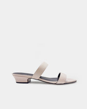 Side view of nude leather heeled strappy sandals