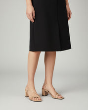 Model wearing nude strappy sandals with comfort block heel Australia