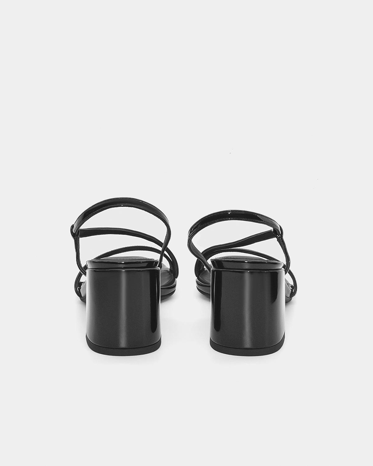 Black strappy block heel sandals in patent leather
