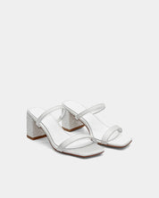 White sandals with leather straps and block heel