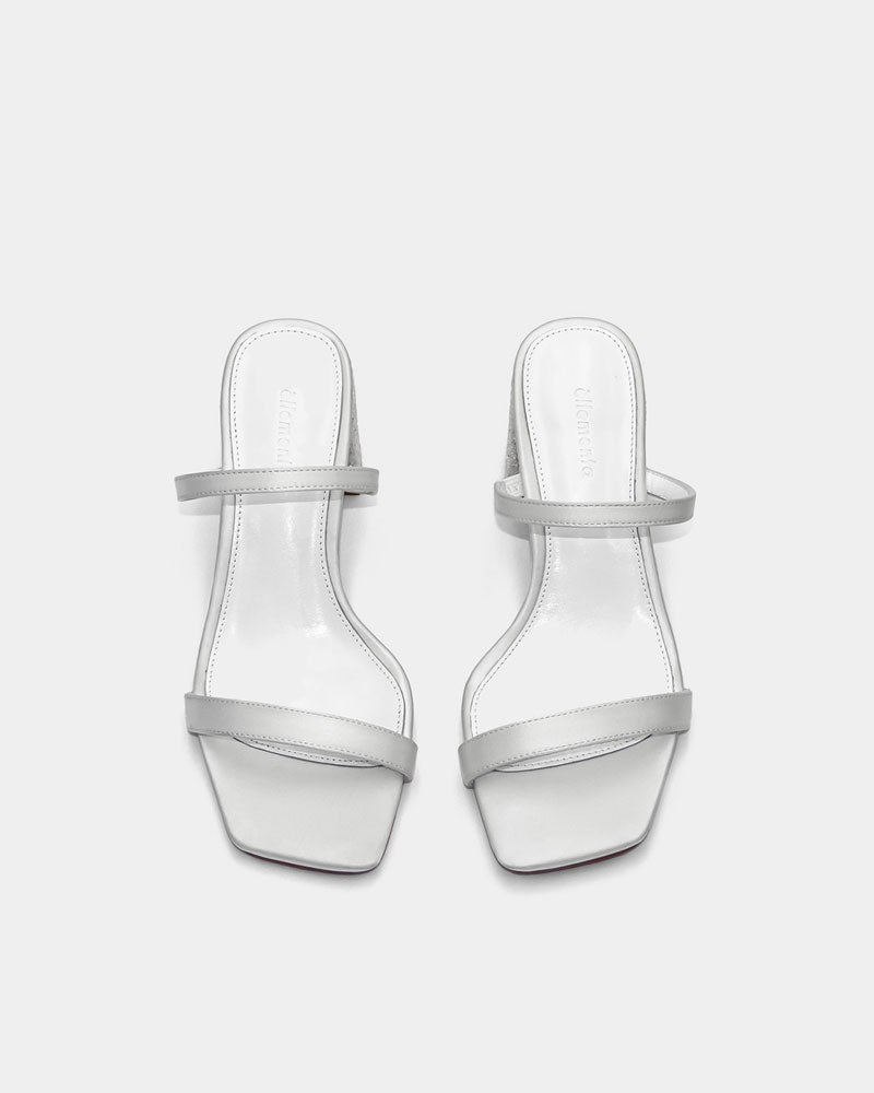 White sandals with cushioned leather footbed