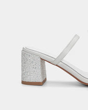 White sandal with a glittery block heel 