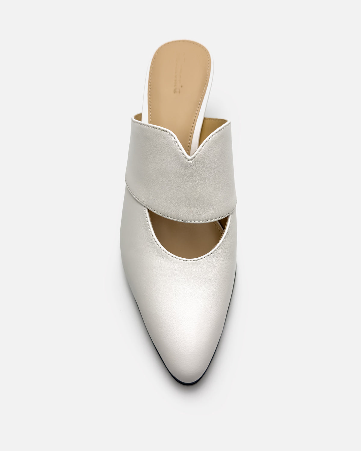 Top view of white mules in leather