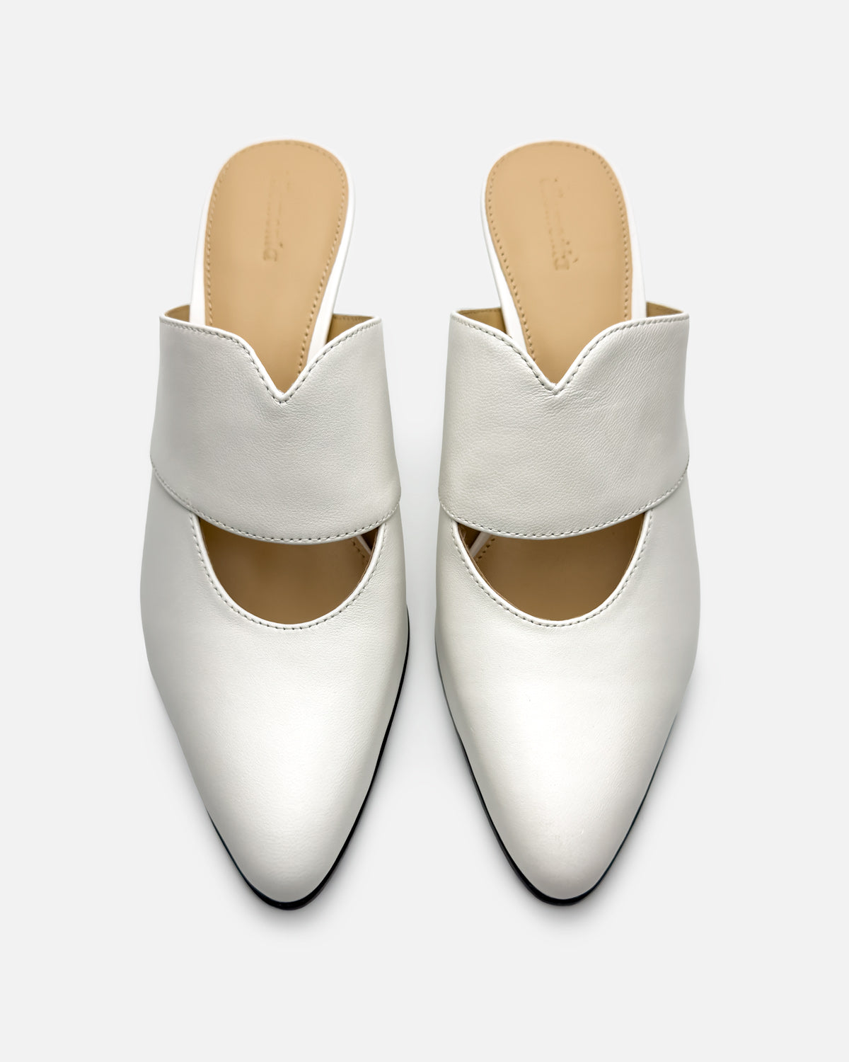 Pair of white mules in leather for women 
