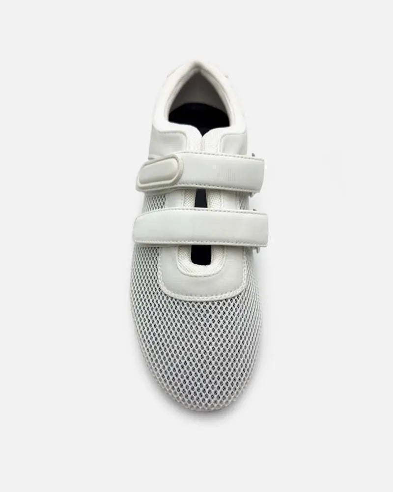White sneakers with strap and mesh upper