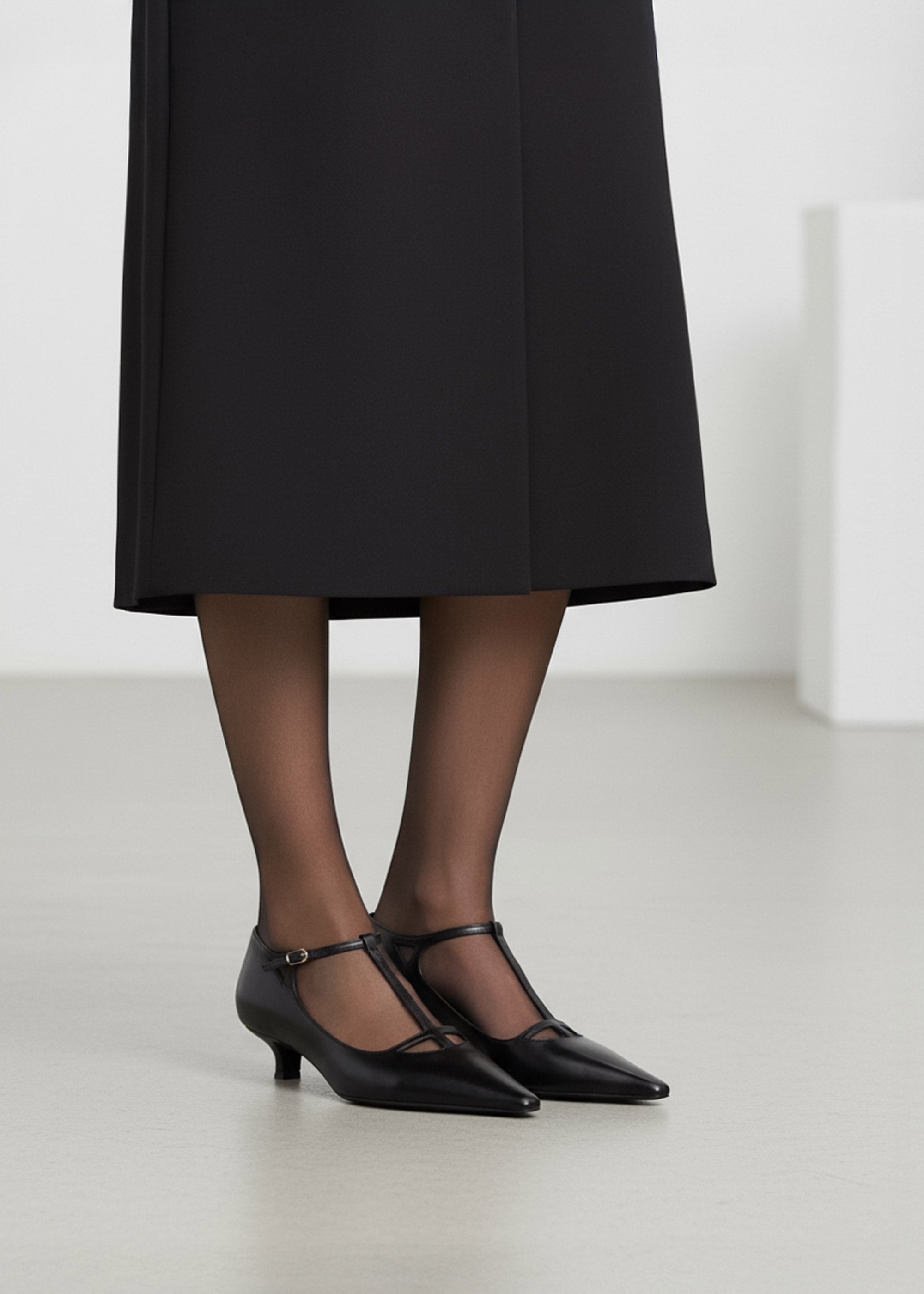 Black kitten heels in black leather with T strap for ladies dress shoes Australia