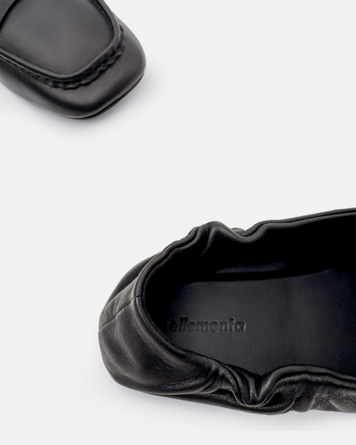 Lightweight flexible sole on women’s black leather loafers by èllementa