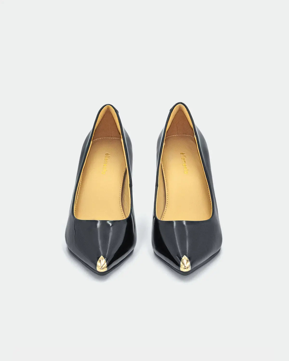 stylish black heeled shoes in glossy patent leather as evening shoes 